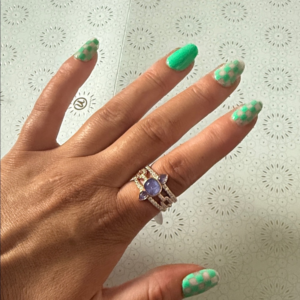 Elegant Silver and Purple Gemstone Ring
